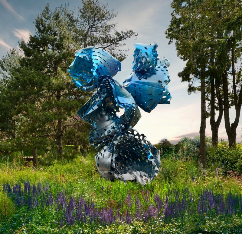 The installation of a large Lupine sculpture in a private garden